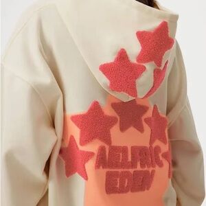 Cream Hoodie with Pink Star Design